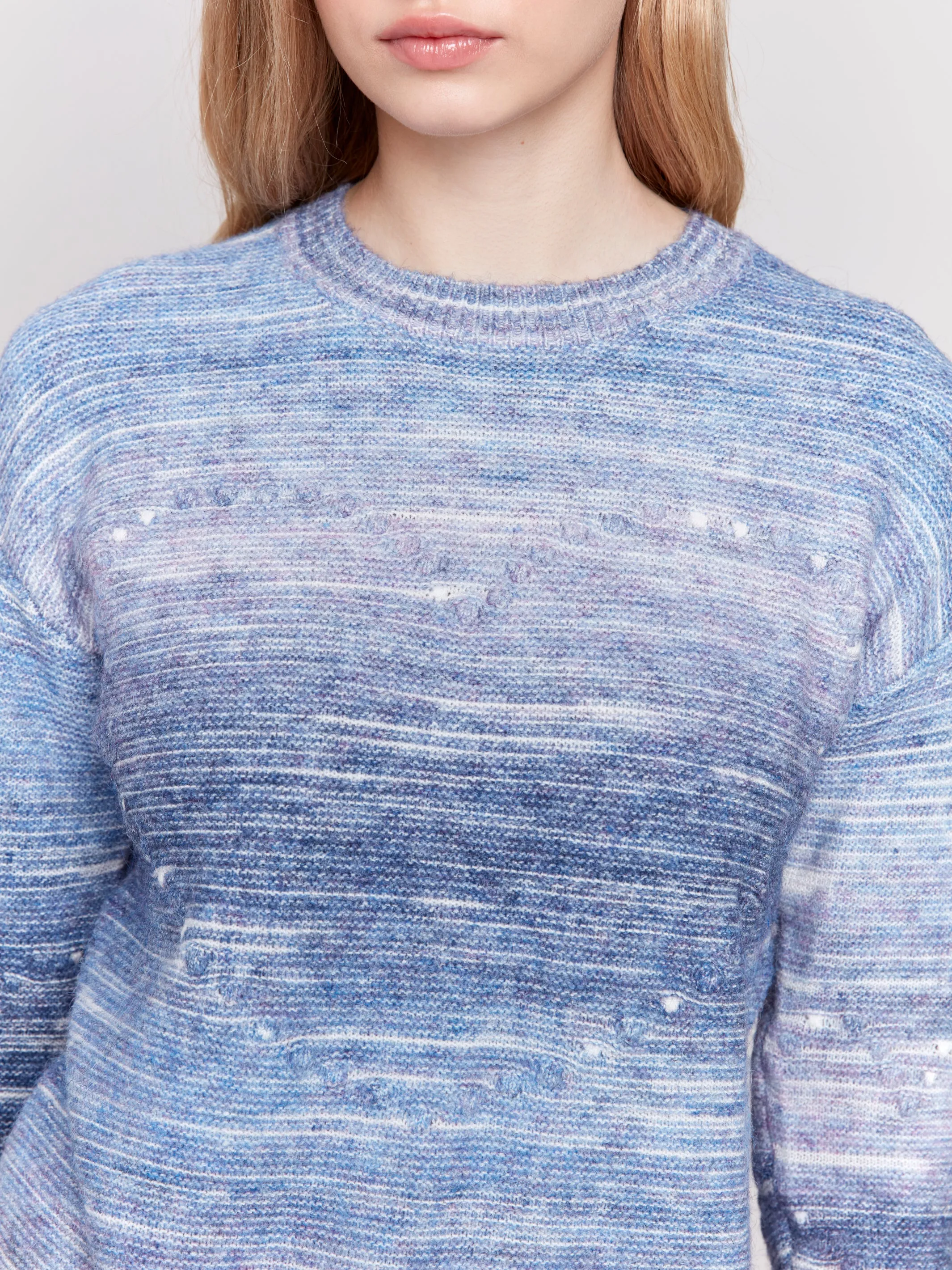 SPACE DYE CABLE KNIT SWEATER