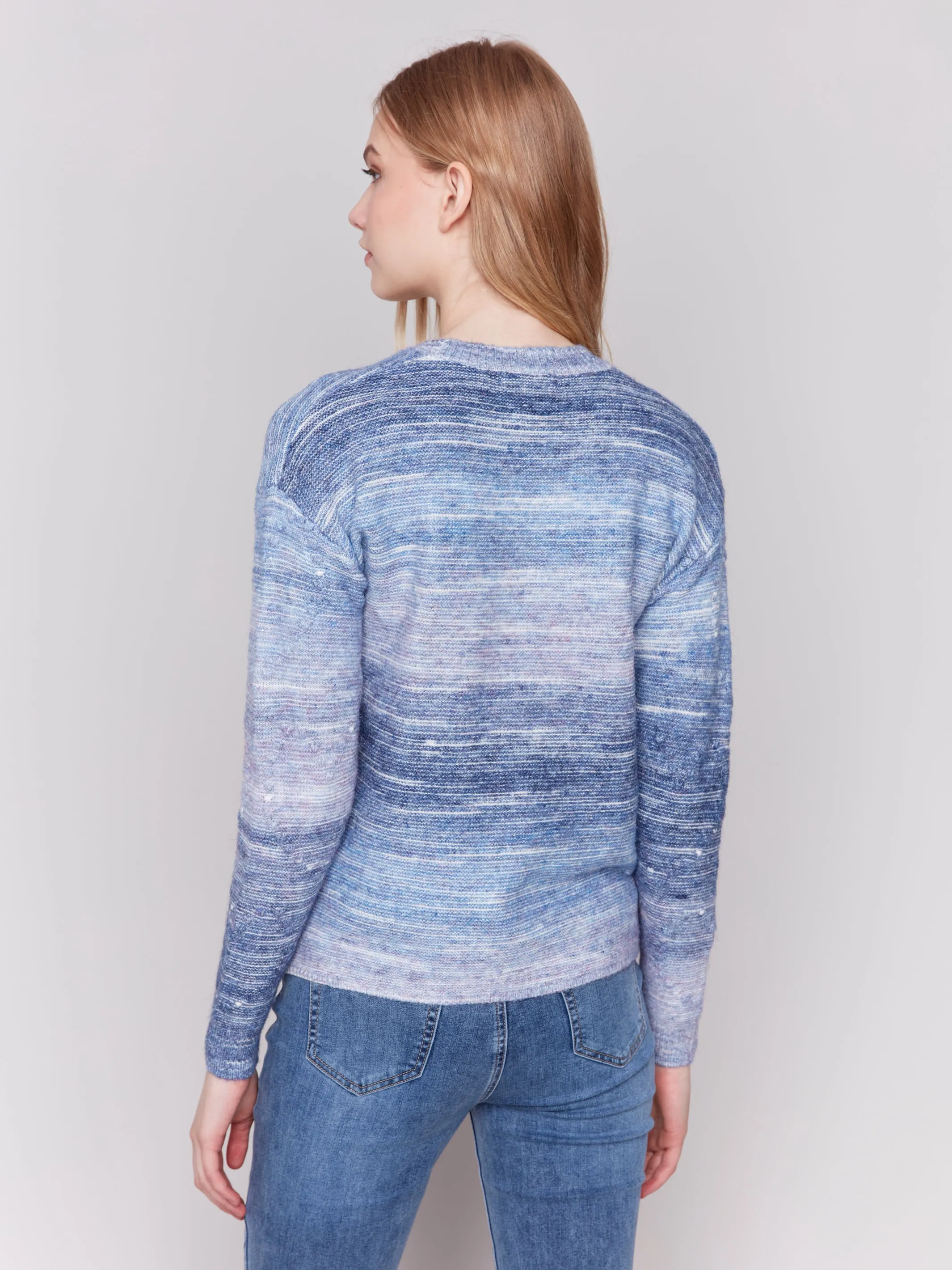 SPACE DYE CABLE KNIT SWEATER