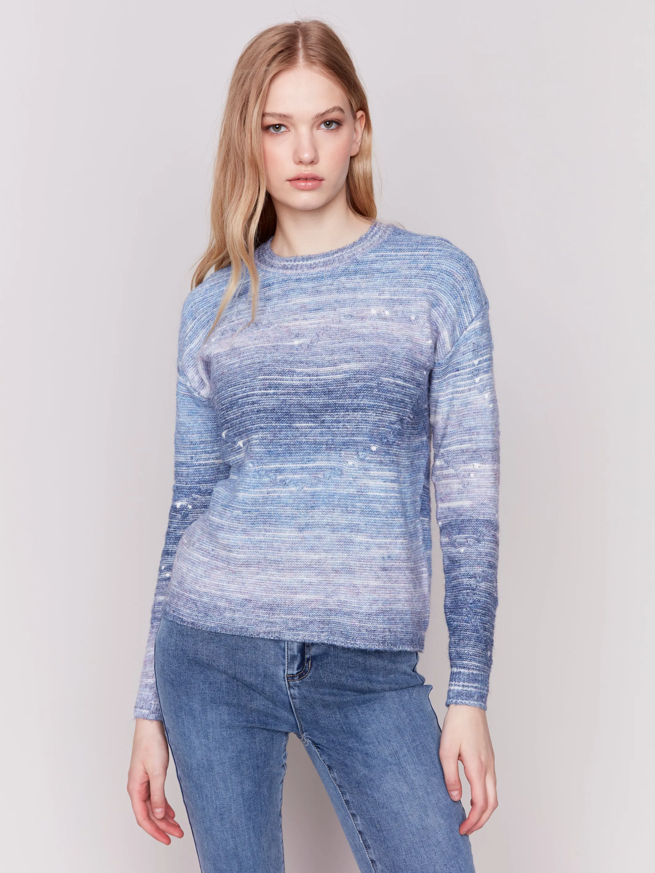 SPACE DYE CABLE KNIT SWEATER